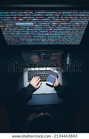 Similar – Image, Stock Photo Cyber security threat. Young woman using computer and coding. Internet and network security. Stealing private information. Person using technology to steal password and private data