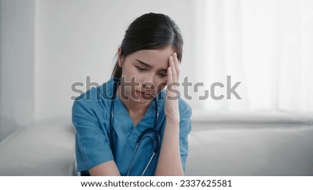 Similar – Image, Stock Photo Sad, exhausted doctor sitting in a dark room