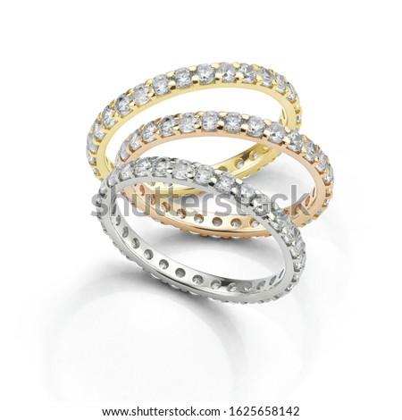 Diamond Eternity Rings Stack in Rose Gold Yellow Gold and White Gold 商業照片 © 