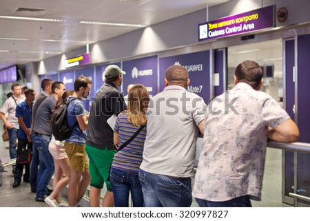 AIRPORT  BORYSPIL,  UKRAINE - September 01, 2015: People meet relatives at the airport.