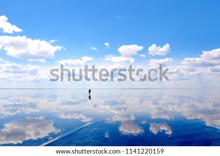 Similar – Image, Stock Photo Reflection of the sky in the harbour basin at sunset