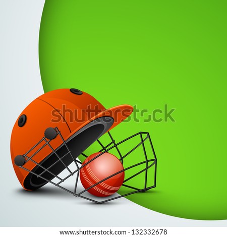 Sports concept with cricket helmet with ball on abstract green background.