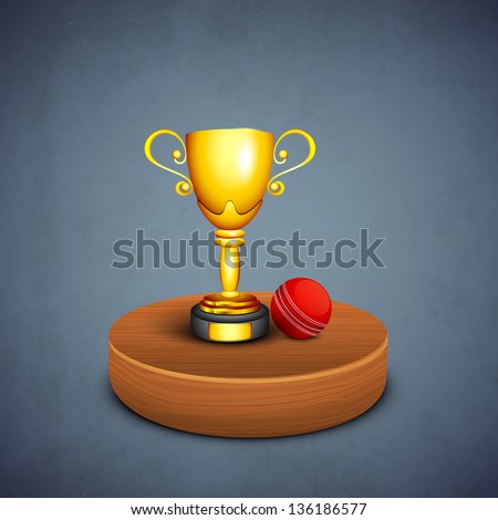 Winning golden cup with cricket ball on stage, sports concept.
