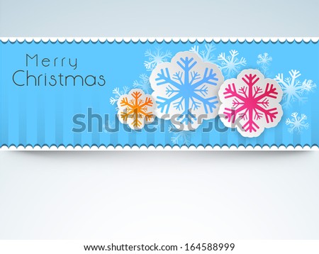 Merry Christmas celebration greeting card or invitation card with beautiful snowflakes on blue and grey background.