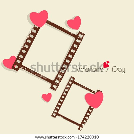 Happy Valentines Day celebration concept with blank photo frame set on brown background, love concept.