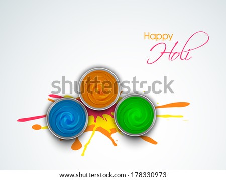 Indian festival Happy Holi celebrations concept with colour paint on grey background.