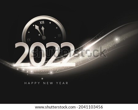 2022 Happy New Year Text With Countdown Clock And Light Effect Wave On Black Background.