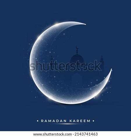 Ramadan Kareem Concept With Glowing Crescent Moon On Blue Silhouette Mosque Background.