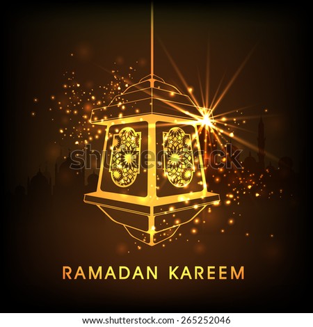 Beautiful golden arabic lantern on shiny brown background for Islamic holy month of prayers, Ramadan Kareem celebrations.