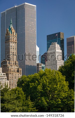 Summer afternoon view of the South East corner of Central Park and Fifth Avenue, Manhattan, New York City.