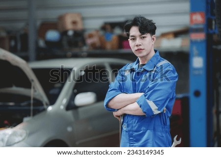 Similar – Image, Stock Photo young male mechanic works in his home workshop