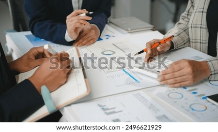 Similar – Image, Stock Photo Businesswoman making notes during workday at home