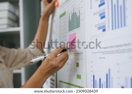 Similar – Image, Stock Photo Businesswoman making notes during workday at home