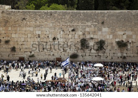 JERUSALEM - MAY 20: The Western Wall, one of the most sacred places to the Jewish religion. The  place is filled with Bar-Mitzvah boys and their families, on May 20 2010 in Jerusalem, Israel.