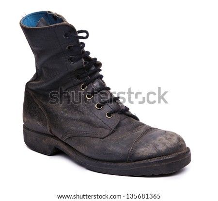 Diagonal view of a very worn right boot, issued by the Israeli army (IDF). isolated on white background.