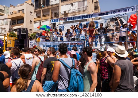 TEL-AVIV - JUN 7: People partying at the annual gay parade in the streets of Tel-Aviv, Israel on June 7 2013.