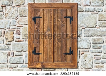 Similar – Image, Stock Photo old closed shutters with flaking white lacquer and rusty hinges in brick facade with partly missing plaster that have seen better days ;old