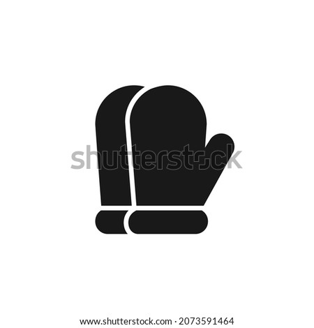 Isolated black icon of pair of mittens on white background. Silhouette of winter clothes. Logo flat design. Winter sport equipment.