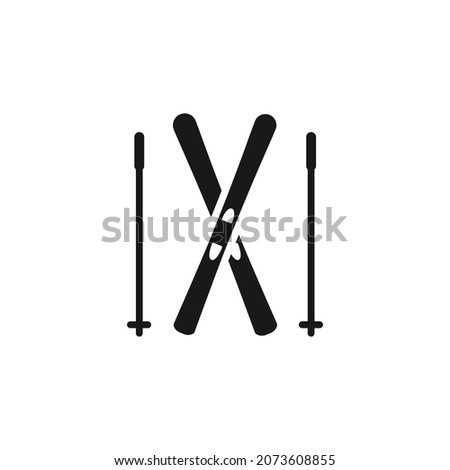 Isolated black icon of pair of alpine skiing on white background. Silhouette of pair ski with ski poles. Logo flat design. Winter mountain sport.