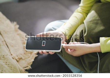 Similar – Image, Stock Photo woman charging batteries in the middle of nature