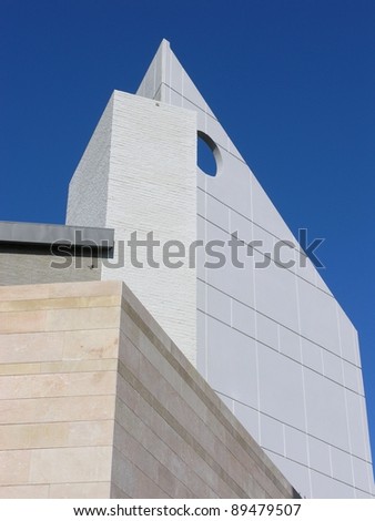 Modern architecture building detail against blue sky with copy space