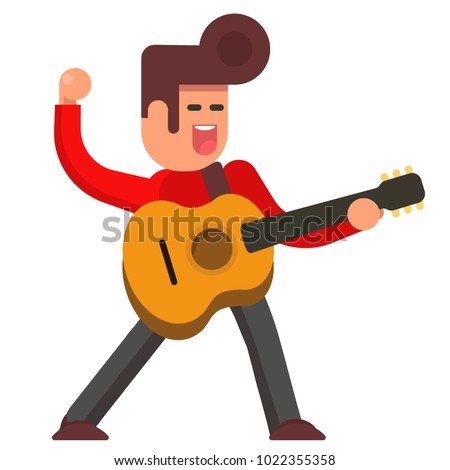 Excited young man with acoustic guitar.  Musician man.