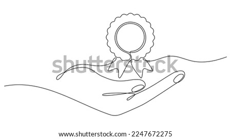 Hand holds award badge continuous one line drawing. Vector illustration isolated on white.