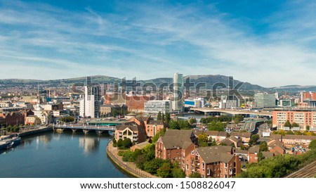 Aerial view on river and buildings in City center of Belfast Northern Ireland. Drone photo, high angle view of town 