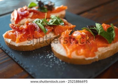 Similar – Image, Stock Photo Gourmet canapes of raw Iberian ham.