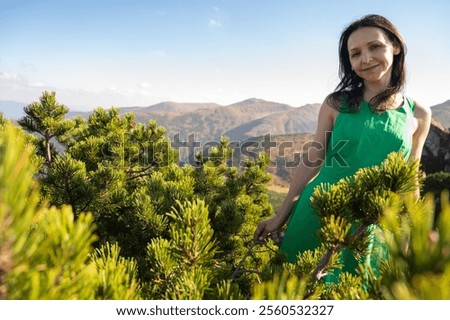 Similar – Image, Stock Photo Tranquil female traveler among palms at seashore