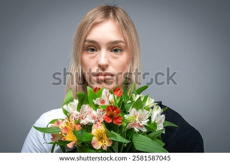 Similar – Image, Stock Photo Serious woman with blooming twigs in garden
