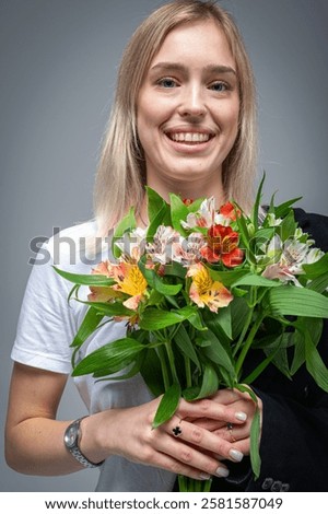 Similar – Image, Stock Photo Serious woman with blooming twigs in garden