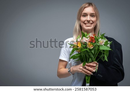 Similar – Image, Stock Photo Serious woman with blooming twigs in garden
