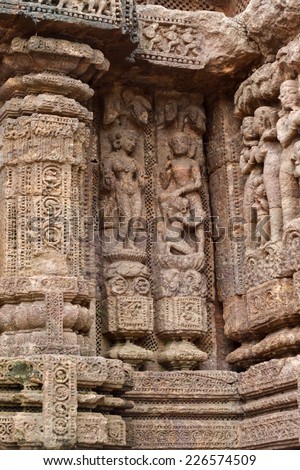 Ancient carvings of dancers on the walls of the Sun Temple in Konark, India.
