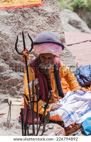 BADARINATH - INDIA, JUNE 5th - An old sadhu at the temple of Badarinath in North India on June 5th 2013