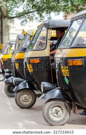 MYSORE, INDIA JULY 24th Â Auto rickshaws in a line in Mysore, South India in Mysore, South India on 24th July 2010.