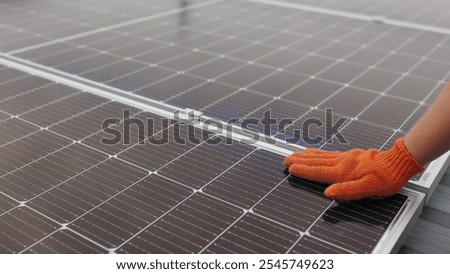 Similar – Foto Bild Unerkennbarer Ingenieur am Solarpanel