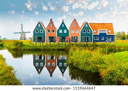Volendam is a town in North Holland in the Netherlands. Colored houses of marine park in Volendam. North Holland, Netherlands. ストックフォト © 