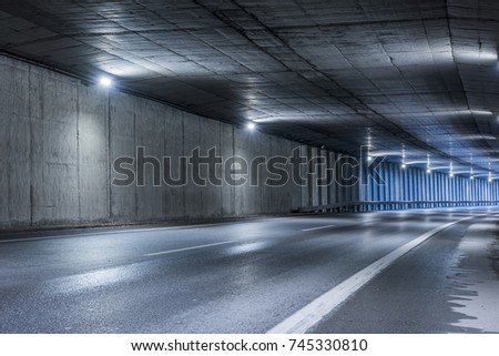 Similar – Image, Stock Photo Highway tunnel. Interior of urban tunnel without traffic in nught with blue lights. Rome, Italy