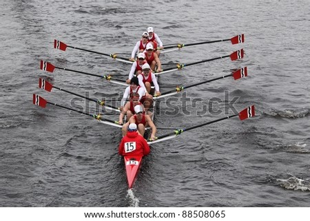 BOSTON - OCTOBER 23: Community Rowing youth men\'s Eights races in the Head of Charles Regatta. Marin Rowing Association won with a time of 15:06 on October 23, 2011 in Boston, MA.