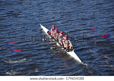 BOSTON - OCTOBER 20: Marina Aquatic Center Junior Rowing (USA) races in the Head of Charles Regatta on October 20, 2013 in Boston, MA