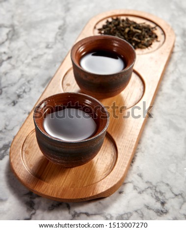 Japanese tea culture, three cups of Pu'er tea Stock fotó © 