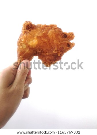 Hand Hold Fried Chicken Isolated On White Images And Stock