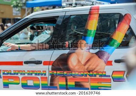 TORONTO, CANADA - JUNE 29:   Toronto  WorldPride Parade, June 29, 2014. Toronto celebrates 34 years of Pride and the excitement of hosting WorldPride 2014. Ontario Durham region Police Car