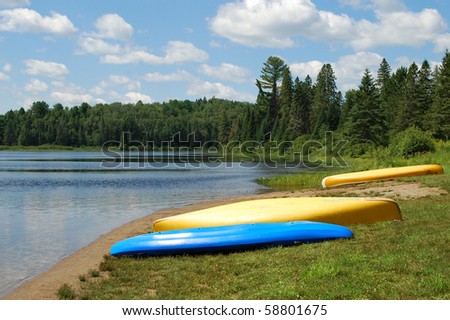 Three kayaks on a beach, Algonquin Provincial Park