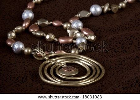 Gold and Copper necklace pendant with strung pearls