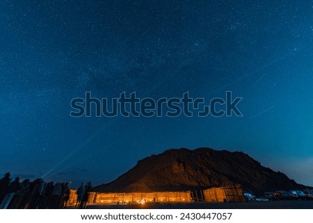 Similar – Foto Bild Tourist mit Blick auf Bergwasserfall