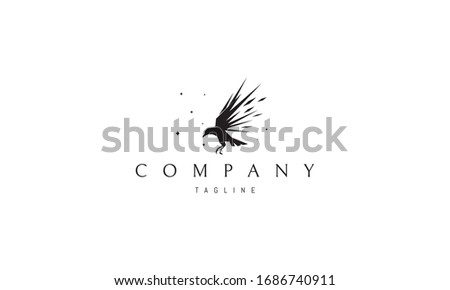 Vector logo on which an abstract image of a flying raven with sharp wings.