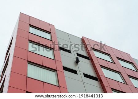 Similar – Image, Stock Photo Colorful facade of an old building with skylights and tile attic