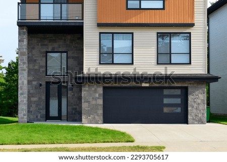 Similar – Image, Stock Photo Windows of a modern building and blooming tree